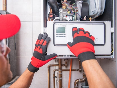 a person working on a water heater