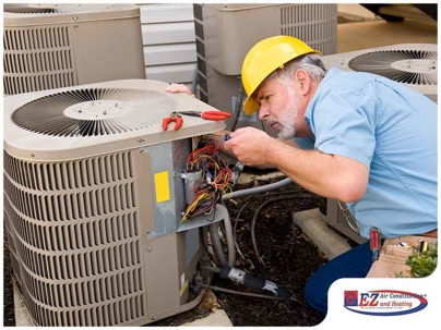 HVAC technician repairing the unit