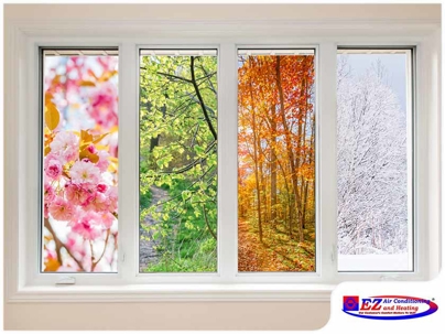 window with four panels, each showcasing a different season