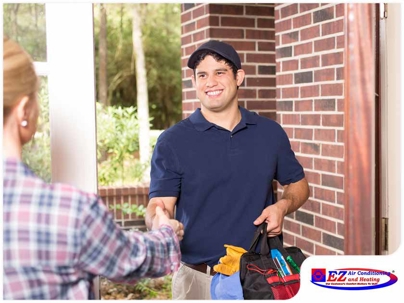 technician shaking hands to the house owner