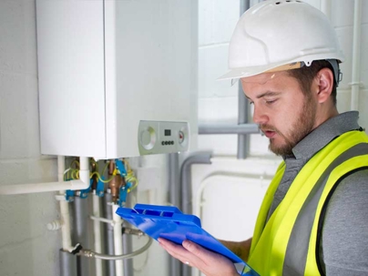 a technician doing an inspection of the unit