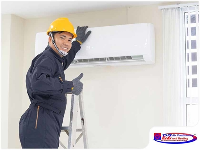 technician installing or servicing a mini-split air conditioning unit